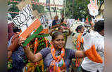 BJP party workers celebrate victory in Maharashtra