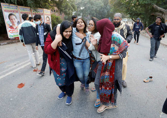 In pics: Jamia University turns into war zone amid protest against CAA