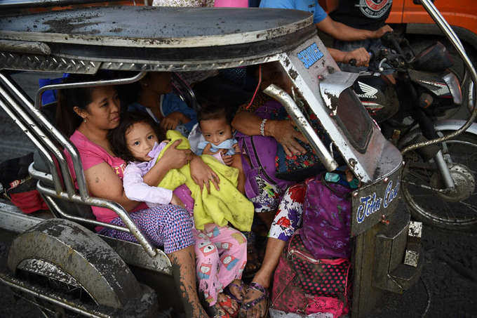 In pics: Thousands flee as Philippines volcano spews lava