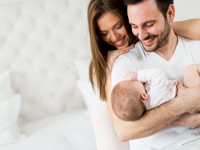 Happy family with newborn child