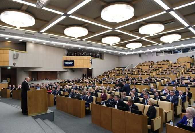 Russias President Putin attends a session of the lower house of parliament in Moscow