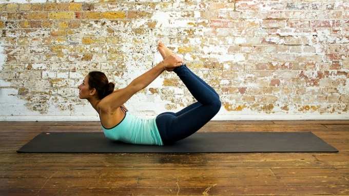 #2. ധനുരാസനം (Bow pose)