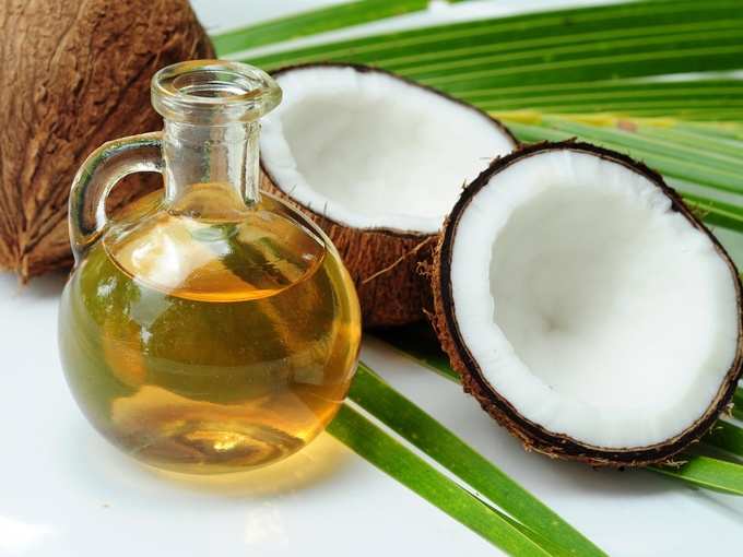 applying coconut oil on hair