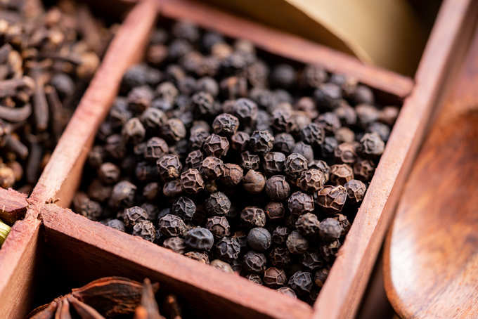 Black pepper in a box of spices