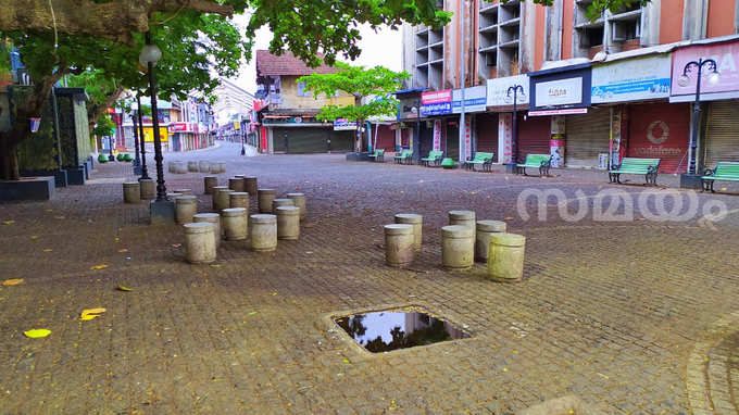 ലോക് ഡൗണിൽ നിശ്ചലമായ കോഴിക്കോട് നഗരം; ചിത്രങ്ങൾ കാണാം.