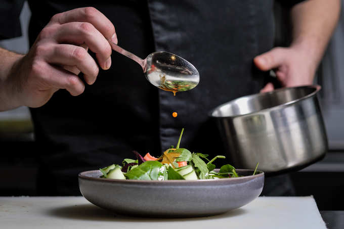 Close-up of the hands of a male chef