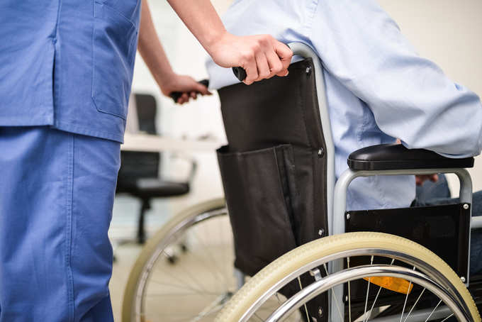 Nurse pushing a wheelchair