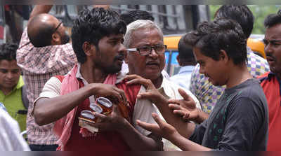 മദ്യ ഷോപ്പുകള്‍ തുറന്നു; കനത്ത തിരക്ക്, കിലോമീറ്ററുകള്‍ ക്യൂ, ലാത്തിച്ചാ‍ര്‍ജ്