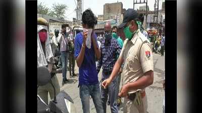 Rajasthan lockdown : चालान काटने दौड़ें पुलिसकर्मी, तो युवक ने उन पर ही चढ़ा दी बाइक