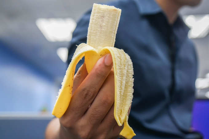 Men eating Banana