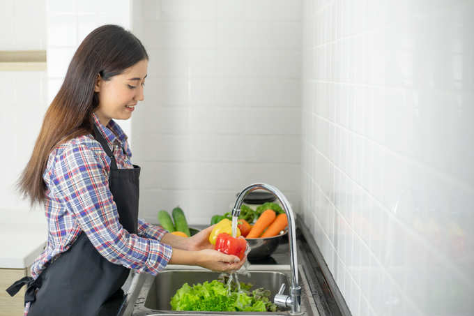 Washing vegetables in the kitchen