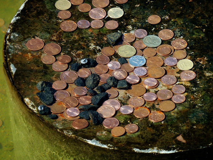 Throwing Coins Into Water Benefits