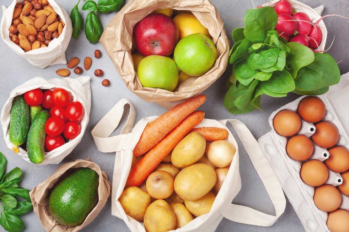 vegetables and fruits in textile and paper bags