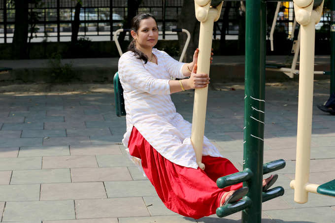 Women doing exercise in park