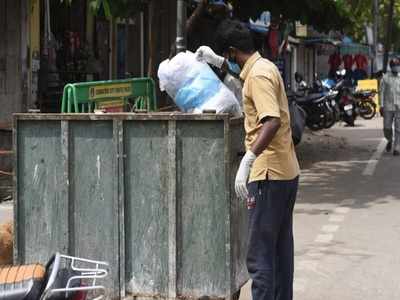 குப்பை தொட்டியில் அலட்சியமாக கொட்டப்படும் கொரோனா கழிவுகள்