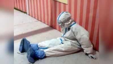 PPE કિટ પહેરીને થાક ઉતારતા નર્સનો ફોટોગ્રાફ થયો વાયરલ