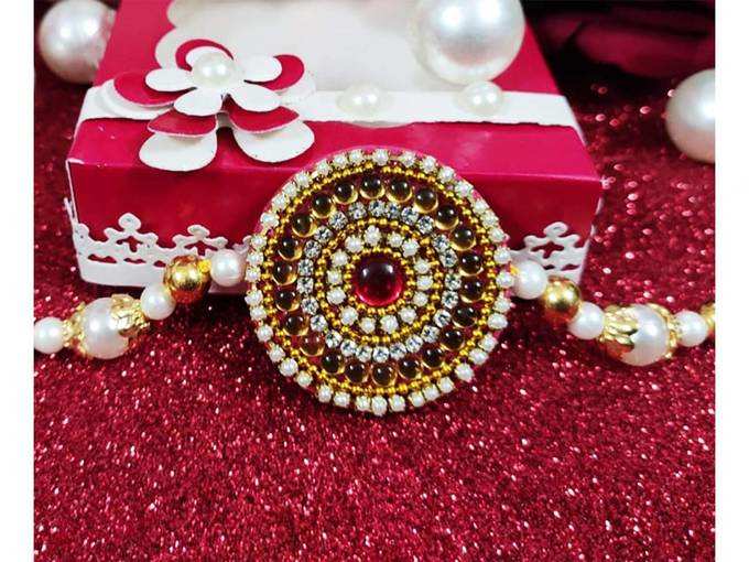 Rakhi Gift for Brother with Two Scented Rose Candle, Roli and Chawal (Red_Yellow)