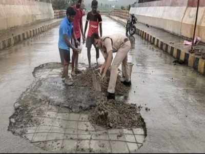 శభాష్ ఏపీ పోలీస్: జోరు వానలో పార పట్టిన కానిస్టేబుల్.. సొంత డబ్బుతో..!