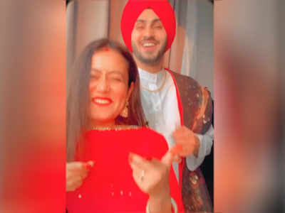 शादी के बाद नेहा कक्‍कड़ ने शेयर किया पसंदीदा गाने का वीडियो, पीछे से किस करते दिखे रोहनप्रीत