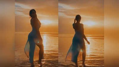 ब्लू ट्रांसपैरंट ड्रेस में नोरा फतेही ने शेयर किया वीडियो, समंदर किनारे सूर्यास्त का ले रहीं मजा