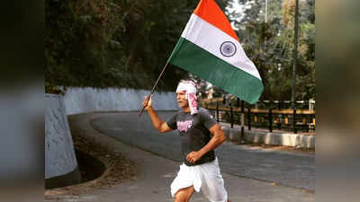 गणतंत्र दिवस पर तिरंगा लेकर दौड़े मिलिंद सोमन, तस्‍वीर शेयर कर लोगों से पूछा- गेस करो