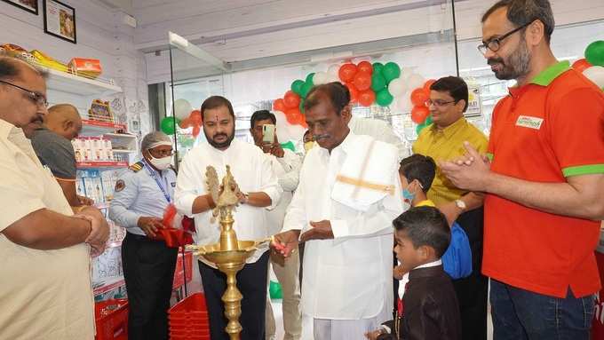 A farmer Kavali Yadaiah seen lighting the lamp and inaugurating Urban Farm Fresh store