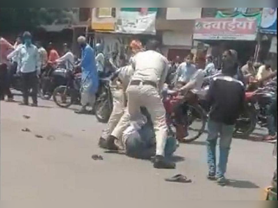 Madhya Pradesh : नाकावरून मास्क खाली घसरला, पोलिसांकडून रस्त्यावरच बेदम मारहाण