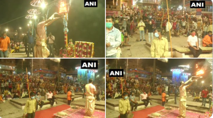 उत्तर प्रदेश: वाराणसी में सार्वजनिक जगहों पर भीड़ पर प्रतिबंध लगाए जाने के बावजूद गंगा घाट पर आरती के दौरान लोगों की भीड़ देखी गई।