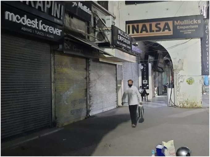 राजधानी में रात नौ बजे से पहले ही गिरे दुकानों के शटर