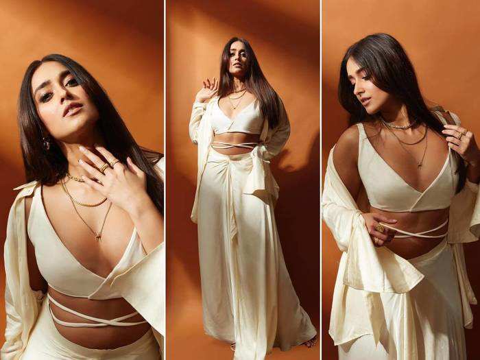 ileana dcruz is making the temperatures soar in a white bralette top and pleated skirt