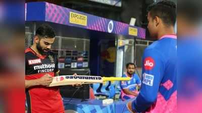 Virat Kohli Signs Riyan Parag’s Bat: 19 साल के क्रिकेटर को बैट पर ऑटोग्राफ देते नजर आए कैप्टन कोहली, फ्रैंचाइजी ने शेयर किया फोटो