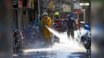 এস্রাজ ছেড়ে কাঁধে স্যানিটাইজার মেশিন