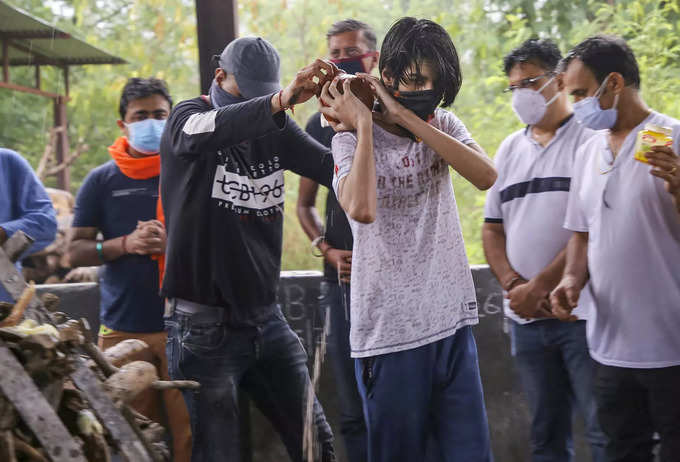 Jammu: Last rites of BJP leader Rakesh Panditas son, who was killed Wednesday i...