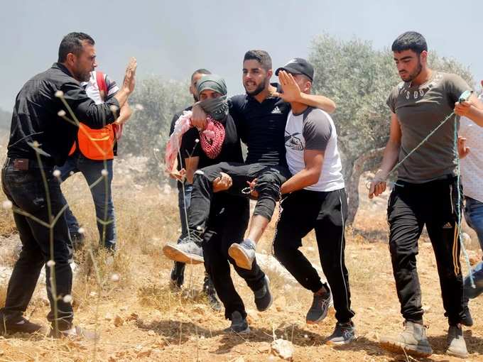 Palestinians protest against Israeli settlements, in West Bank (1).