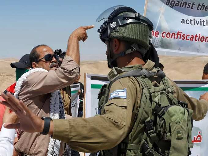 Palestinians protest against Israeli settlements, in West Bank (2).