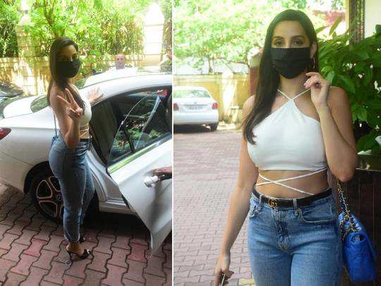 Nora Fatehi pairs ₹4 lakh bag with chic white crop top and denims, see pics