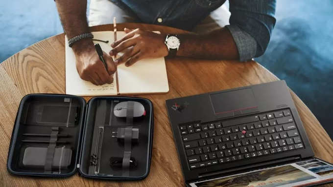 Lenovo-Go-accessories-in-tech-organizer-on-table-with-someone-working-1024x577.