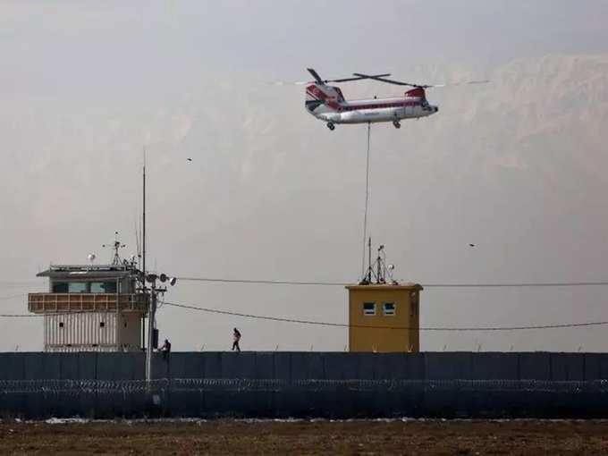 FILE PHOTO_ Chinook helicopter flies over the Bagram Air Base north of Kabul.