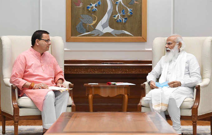 pushkar singh meets pm modi