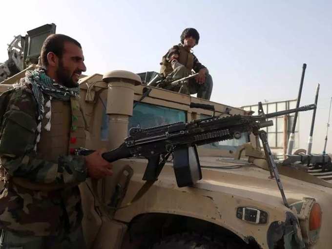 Afghan National Army soldiers keep watch at checkpoint in Guzara district of Herat province (1).