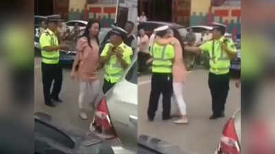 Viral Video: रिश्वत नहीं ले रहा था पुलिस वाला, महिला ने बीच सड़क पर कर डाला kiss!
