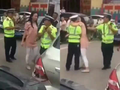 Viral Video: रिश्वत नहीं ले रहा था पुलिस वाला, महिला ने बीच सड़क पर कर डाला kiss!