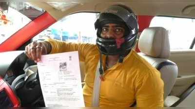 Kanpur News: कानपुर में युवक हेलमेट लगाकर चला रहा कार... वजह जानकर रह जाएंगे हैरान