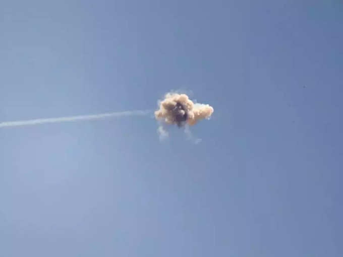 An explosion is seen midair as Israel&#39;s Iron Dome anti-missile system intercepts a rocket launched from the Gaza Strip, as seen from near Sderot.
