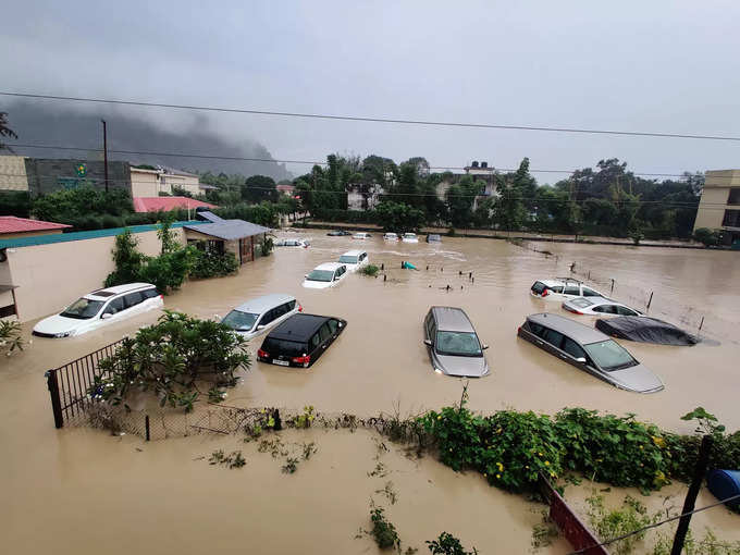 Uttarakhand: Submerged cars are seen at a flooded hotel resort as extreme rainfa...