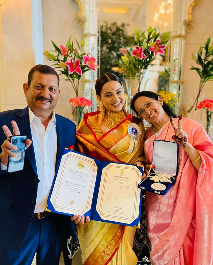 Kangana Ranaut poses with parents