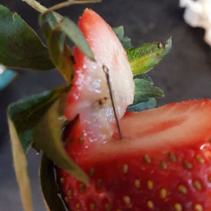 Police find Metal Object Hidden Inside Banana Forced to Pull Strawberries When Needles Were Planted Inside News in Hindi