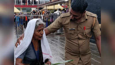 सबरीमाला में पुलिसवाले और बूढ़ी महिला की तस्वीर वायरल, यह है सच