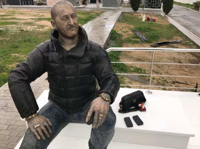 This Life-Size Statue is A Criminal’s Tomb There is Replica of Audi Q5 Also As He Loved It The Most