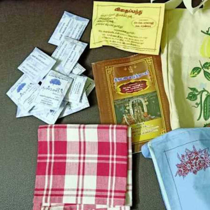 Tamilnadu Deputy collector prints sons wedding cards on handkerchief to reduce plastic and it is being praised